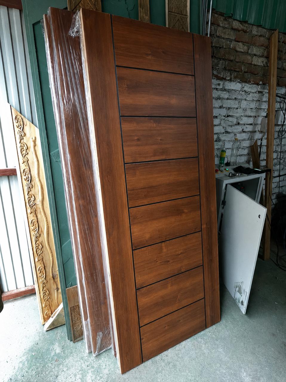 Finished laminated wooden door